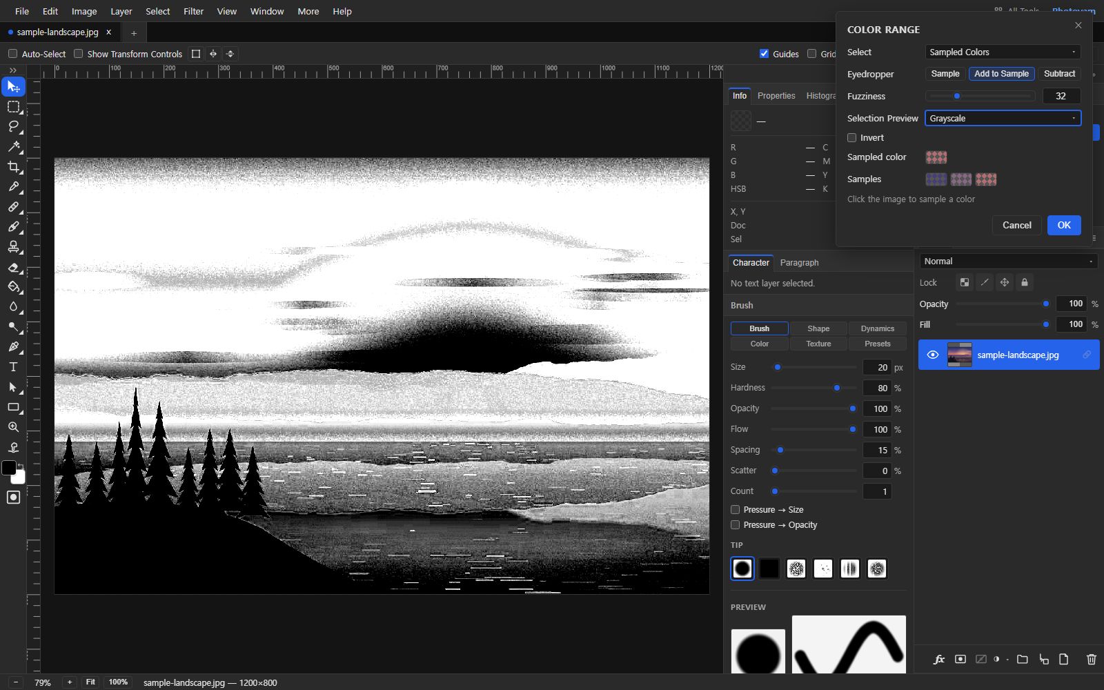 The Color Range dialog in Photoyam set to Sampled Colors, Add to Sample, Fuzziness 32 and Selection Preview Grayscale, with three sample swatches. The canvas shows a grayscale mask of a lake landscape: the sky is mostly white, but the mountains and the lake below are also partly white and gray.